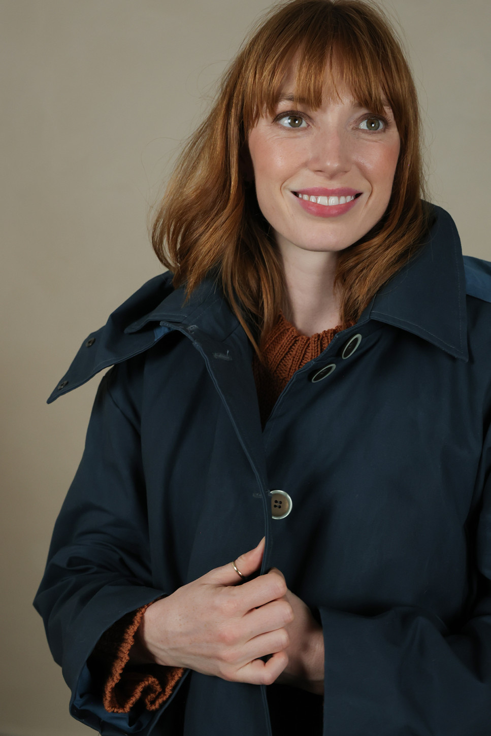 WAXED COTTON ASYMMETRIC RAINCOAT 