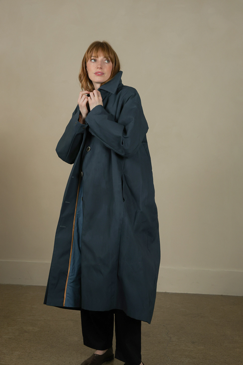 WAXED COTTON ASYMMETRIC RAINCOAT 