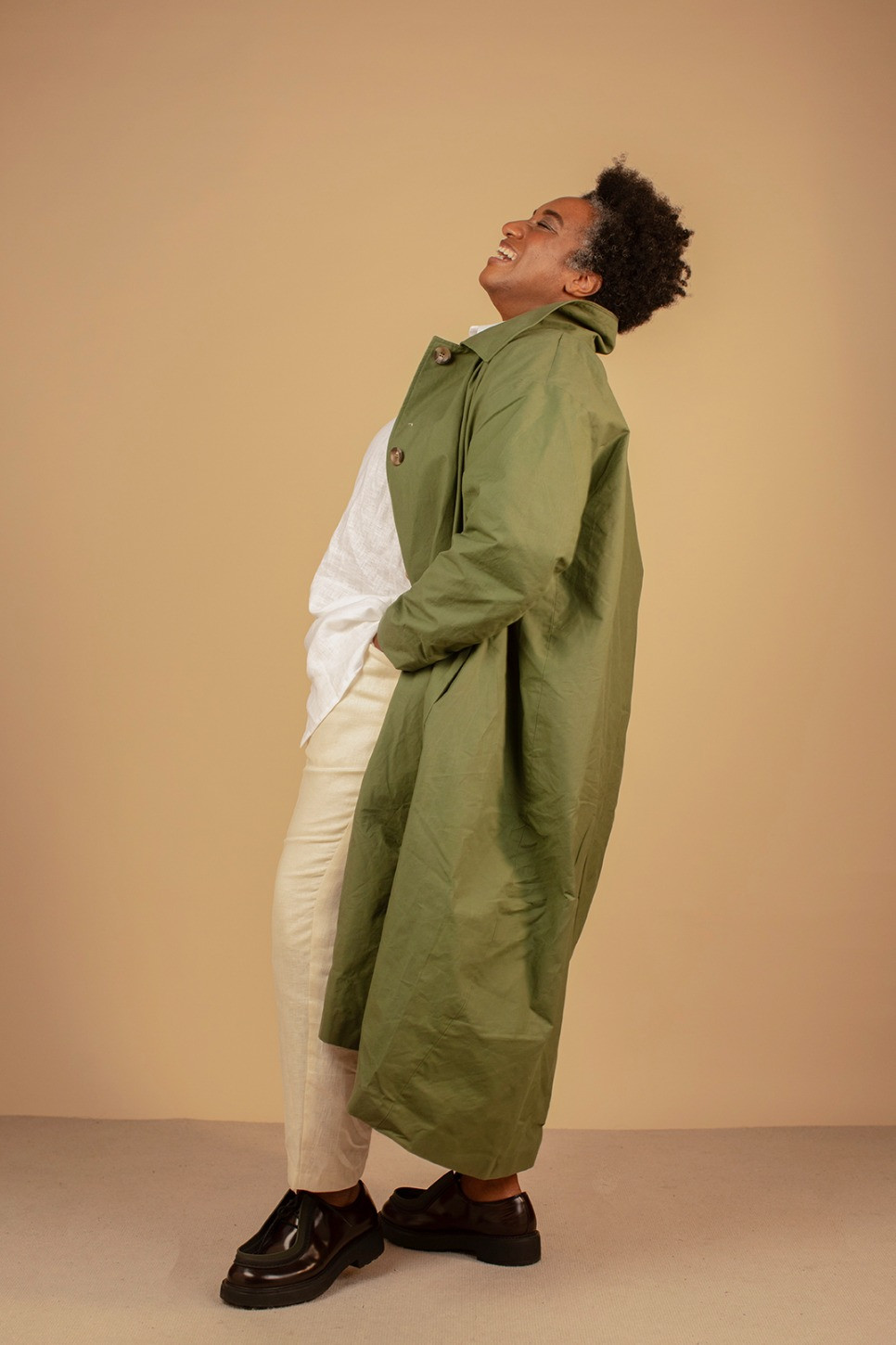 WAXED COTTON ASYMMETRIC RAINCOAT 