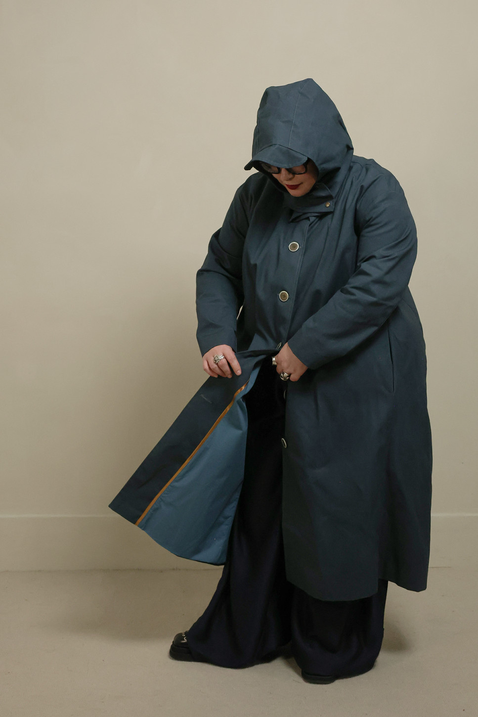 WAXED COTTON ASYMMETRIC RAINCOAT 